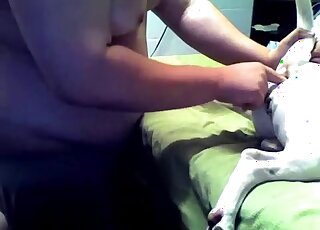 Chubby guy treats dog with anal fingering and ass toying