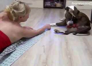 Blonde wife throats the dog's dick on cam in homemade XXX tryout