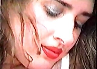 Big boobs brunette blows a black dog in a hot and vintage XXX video