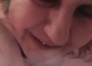 Insatiable mature slut stuffs mouth with a pink dick of a canine