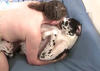 Dirty-minded guy licks pussy of his female dog in a zoo porno video